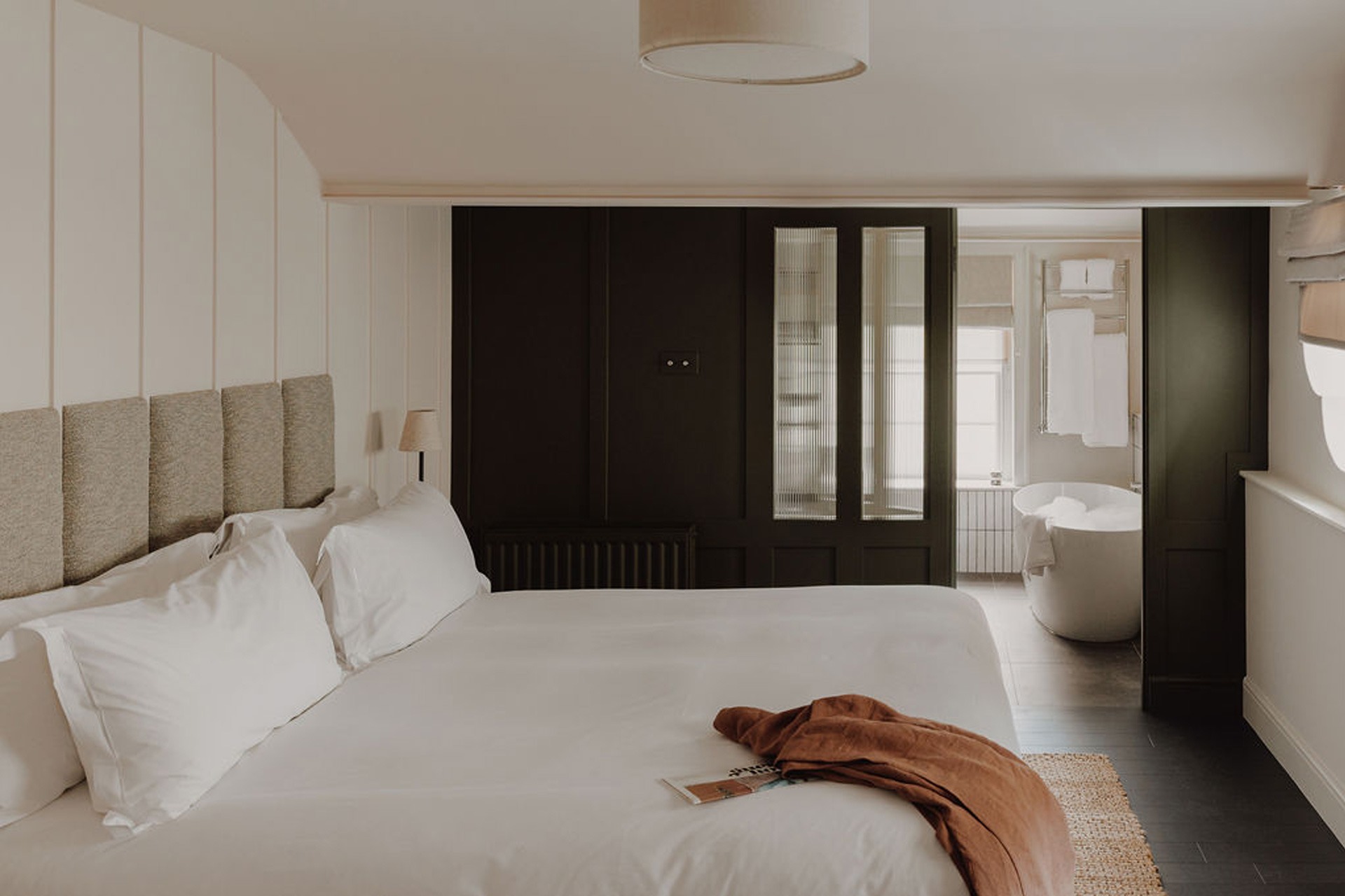 A newly renovated bedroom in the Coach House at GuestHouse Bath